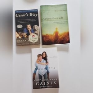 Three books: Magnolia, Cesar's Way and A Miraculous Life